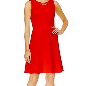 Ivanka Trump orange fit and flare dress